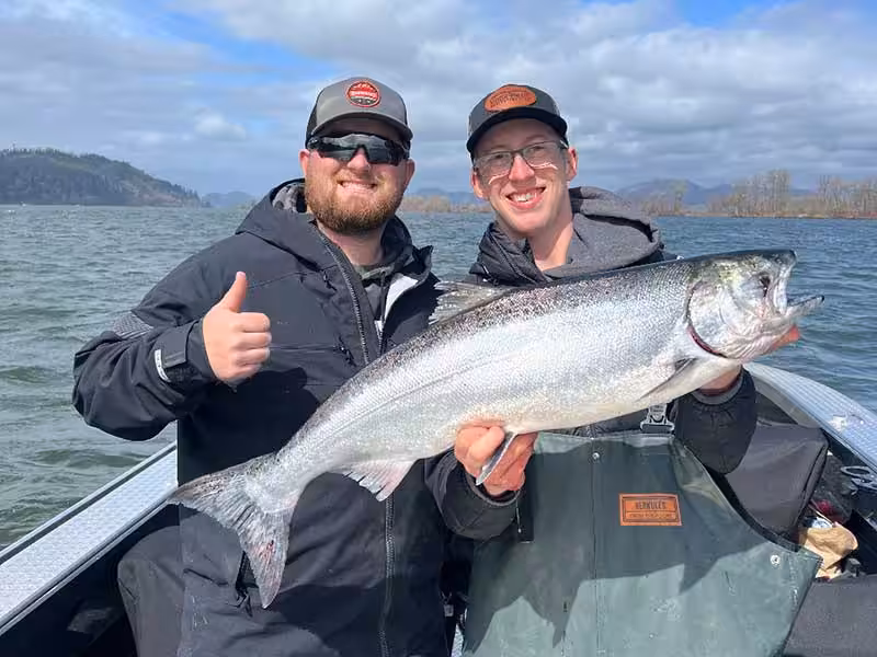 Successful salmon fishing trip on the Columbia River with a trophy Spring Chinook